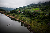 A river cuts through a rural landscape near the old DMZ in central Vietnam.