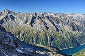 Kleinspitze and Grosser Magner above barrier lake Zillergrund, hut Plauener Huette, Reichenspitze group, Zillertal Alps, Tyrol, Austria