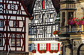 Half timbered house facades on the town hall square, Rothenburg ob der Tauber, Bavaria, Germany