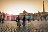 Blurred view of people walking in Saint Peters Square, Rome, Lazio, Italy