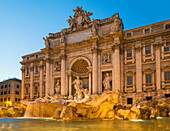 Trevi Fountain under ornate building, Rome, Lazio, Italy