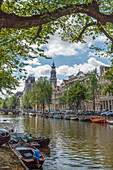 Boats and buildings on Amsterdam canal, Amsterdam, Holland