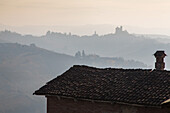 early morning view across to Serralunga d'Alba, vineyards in the Langhe landscape in Piedmont, Italy