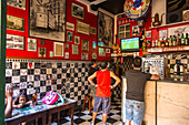 football fans watching European Cup in TV in a bar, Lisbon, Portugal