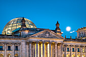 Full moon over the Reichstag, Berlin, Germany