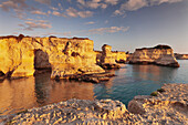 Rocky columns, natural monument, rocky coast at sunrise , Sant'Andrea, Adriatic Sea, Lecce province, Salentine Peninsula, Puglia, Italy, Mediterranean, Europe