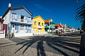 Colourful stripes decorate traditional beach house style on houses in Costa Nova, Portugal, Europe
