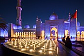 UAE, Abu Dhabi, Sheikh Zayed bin Sultan Mosque, exterior, dusk.