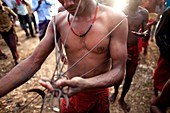 Hindu community devotee piercing with iron stick to celebrate the rituals of Charak Puja also known as Nil Puja in Sylhet, Bangladesh April 13, 2012. Charak Puja (Devotion to God) is an ancient Hindu religious and folk festival of Southern Belt of Banglad