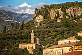 Profitis Ilias, the largest mountan in the Taygetus range, seen from below. Old Kardamyli and the church of Agios Spyridon Outer Mani, Messinia, Peloponnese, Greece.