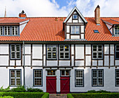 Traditional buildings in the compound of the former monastery Heiligen Kreuz in the city center. The hanseatic city of Rostock at the coast of the german baltic sea. Europe,Germany, Mecklenburg-Western Pomerania, June.