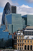 front right: Old Billingsgate Market, steeple of St. Margaret Pattens and the glass cube of Plantation space, in the back Forsters Gherkin, City of London, seen from Southwark, London, Great Britain