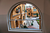 View through Window to Italian Style Garden of Lenbachhaus, Munich, Germany