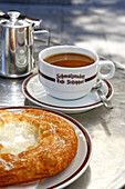 Traditional Schmalznudel and a cup of coffee in Cafe Frischhut, Praelat-Zistl-Strasse, Old town, Munich, Upper Bavaria, Bavaria, Germany