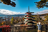 Mt. Fuji and Chureito Pagoda photographed by old men, Fujiyoshida, Yamanashi Prefecture, Japan