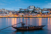 Dawn in Porto, Portugal. Looking from Vila Nova de Gaia across river Douro.