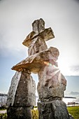 Inukshuk landmark, Canada. Inukshuk is a symbolic structure built by the Inuit man.