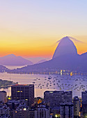 Brazil, City of Rio de Janeiro, View over Botafogo Neighbourhood towards the Sugarloaf Mountain at sunrise.