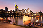 Eiserner Steg Bridge and financial district at sunset, Frankfurt, Hesse, Germany, Europe