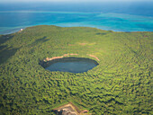 Aerial of Lalolalo lake volcanic crater lake, center of Wallis, Wallis and Futuna, South Pacific, Pacific