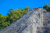 Tourists climbing the temple, Nohoch Mul Temple, Coba, Quintana Roo, Mexico, North America