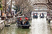 Traditional houses and boat on the Grand Canal, Zhujiajiao, near Shanghai, China