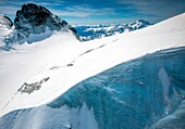 Blue ice in the glacier at the foot of the Cresta Aguzza overlooking the Monte Disgrazia, Mount Disgrazia, Valmalenco, Valtellina, Italy