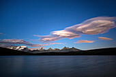 Pink clouds after sunset on Rosset lake at an altitude of 2709 meters, Gran Paradiso national park, Alpi Graie