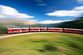 Panning effect for the Bernina Express, Val Poschiavo, Switzerland Europe