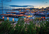 Oslo docks with Akerbrygge quarter on the background, Norway