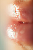 Extreme close-up of woman's wet lips