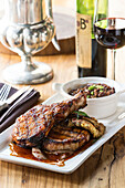 Pork chops and beans with red wine