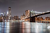 USA, New York City, Downtown Financial district of Manhattan and the Brooklyn Bridge