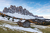 Wooden lodge and Odle Dolomites, Malga Gampen, Funes, Bolzano, Trentino Alto Adige - Sudtirol, Italy, Europe