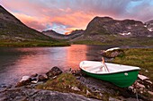 Trollstigen, Norway, Sunset with boat near the Troll Road