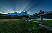 Rolle Pass, Pale di San Martino, Dolomites, Trento, South Tyrol, Italy, Crepuscolar rays behind Pale di San Martino