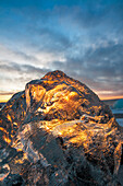 Jokulsarlon glacier lagoon, Iceland, Sunlight reflections over a small black of ice on the shore