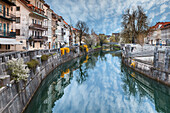 Europe, Slovenia, Ljubljana, Buildings on the Ljubljanica river in early spring