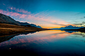 pink sunset in the lake of campagneda, malenco valley, ombardy, italy, europe