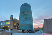 Uzbekistan, Khorezm Region, Khiva, Itchan Kala, Kalta Minor Minaret (W.H.), Sunset