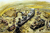 France, Normandy. Manche. Coutances. Miniatures exhibition. Close-up on a miniature second World War scene, with train, trucks, soldiers.