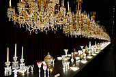France, Paris. 8th district. Petit Palais. Exhibition on Baccarat. Shot of Grand Marly chandeliers with 88 candles (1891) and table sets