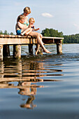 family is swimming, holiday, summer, lake Kreutzsee, MR, Mecklenburg lakes, Mecklenburg lake district, Mecklenburg-West Pomerania, Germany, Europe
