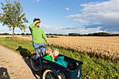 Holiday in the countryside, farm, farm house Bauernkate, bicycle tour, father, kids, MR, Biosphere Reserve Schaalsee, Mecklenburg lake district, Klein Thurow, Mecklenburg-West Pomerania, Germany, Europe