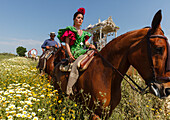 Horse riders, woman and man, El Rocio, pilgrimage, Pentecost festivity, Huelva province, Sevilla province, Andalucia, Spain, Europe