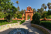 Gateway with palm trees, Jardin Marques de la Vega Inclan, Jardines del Real Alcazar, garden of the royal palace, UNESCO World Heritage, Sevilla, Andalucia, Spain, Europe