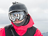 Portrait Of A Skier Wearing Goggles And A Helmet At Cerro Catedral