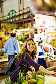 Smiling Woman Shopping In The Market During Vacation In Puerto Rico