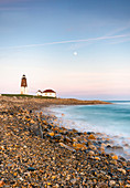 A Dusky Winter Moonrise Over Point Judith Lighthouse Of Narragnsett, Rhode Island
