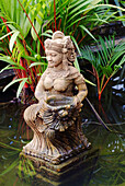 Thai Statue Of A Female Goddess In A Garden Pond, Nong Nooch, Thailand